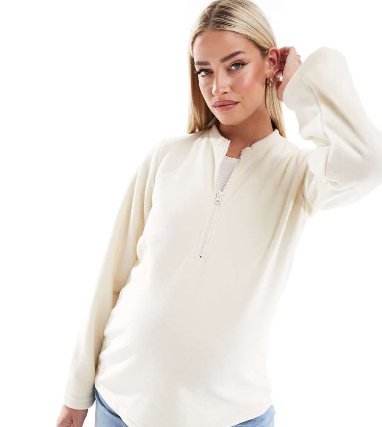 Mamalicious gravid zip-fram fleece med breda ärmar i krämfärgad från Mamalicious